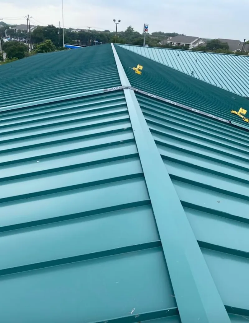 Green commercial metal roof ridge and valley for Metal Roof Repair in Port Townsend